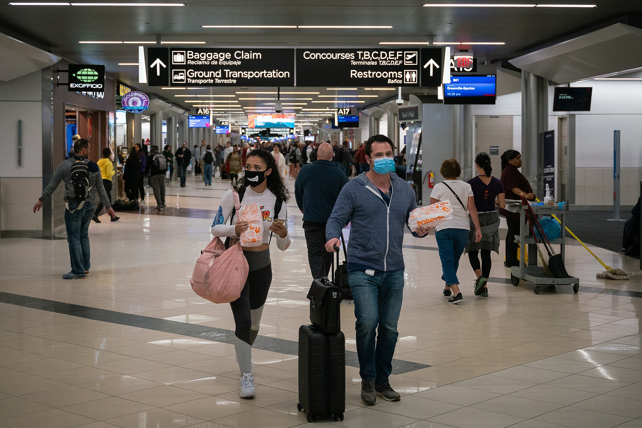 Flyers wearing facemasks at Atlanta International Airport in the United States.
