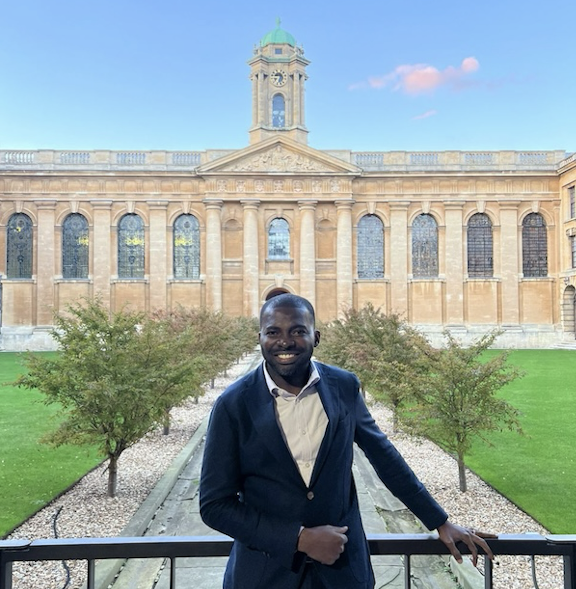 Student in from on Oxford college building