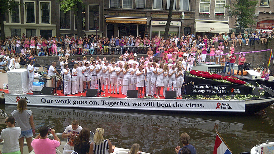 The first boat of Amsterdam Gay Pride Parade 2014 in memory of the MH17 victims, 193 of which were from the Netherlands. Image source: Manjit Nath