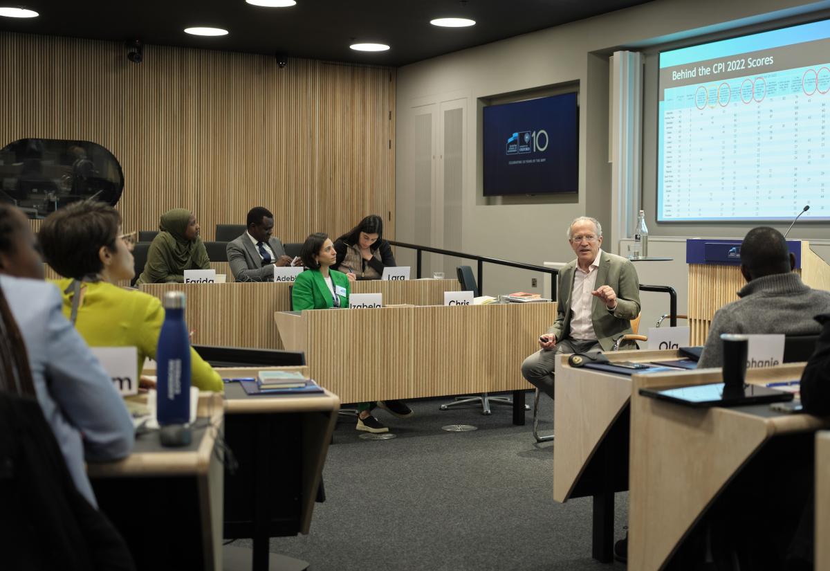 Professor teaching and students in classroom